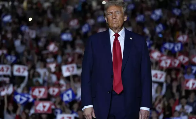 Republican presidential nominee former President Donald Trump arrives at a campaign rally at McCamish Pavilion Monday, Oct. 28, 2024, in Atlanta, Ga. (AP Photo/Julia Demaree Nikhinson)