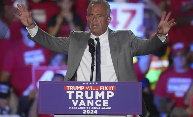 Robert F. Kennedy Jr., speaks before Republican presidential nominee former President Donald Trump at a campaign rally at Macomb Community College Friday, Nov. 1, 2024, in Warren, Mich. (AP Photo/Paul Sancya)