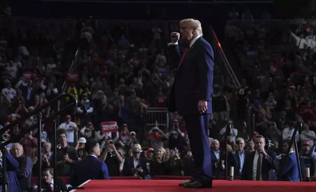 Republican presidential nominee former President Donald Trump gestures at a campaign rally at PPG Paints Arena, Monday, Nov. 4, 2024, in Pittsburgh, Pa. (AP Photo/Evan Vucci)