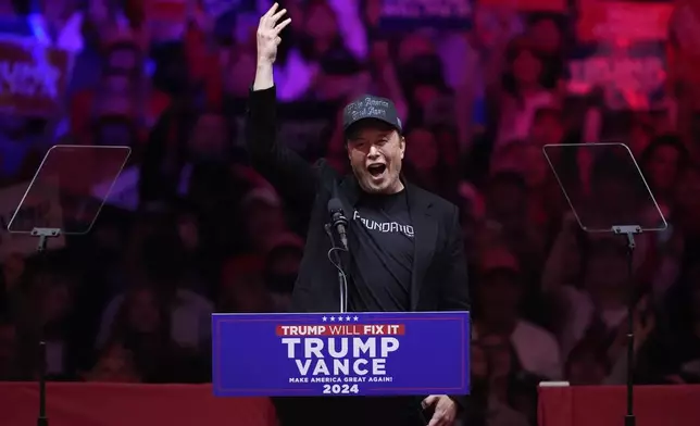 Elon Musk speaks before Republican presidential nominee former President Donald Trump at a campaign rally at Madison Square Garden, Sunday, Oct. 27, 2024, in New York. (AP Photo/Evan Vucci)