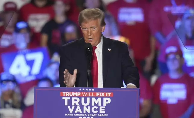 Republican presidential nominee former President Donald Trump speaks at a campaign rally at Macomb Community College Friday, Nov. 1, 2024, in Warren, Mich. (AP Photo/Paul Sancya)