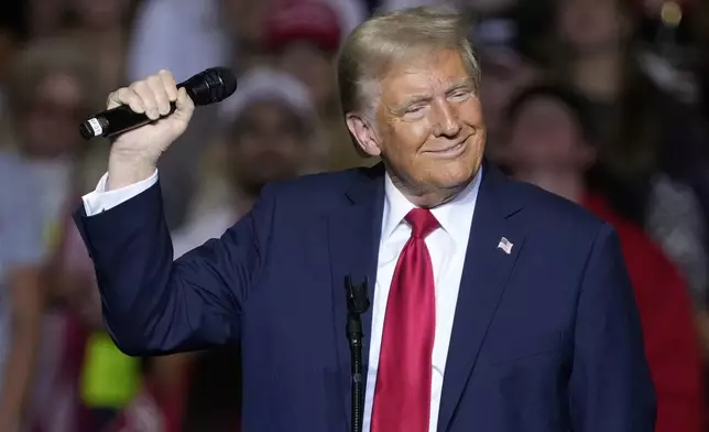 Republican presidential nominee former President Donald Trump speaks at a campaign rally Friday, Nov. 1, 2024, in Milwaukee. (AP Photo/Morry Gash)