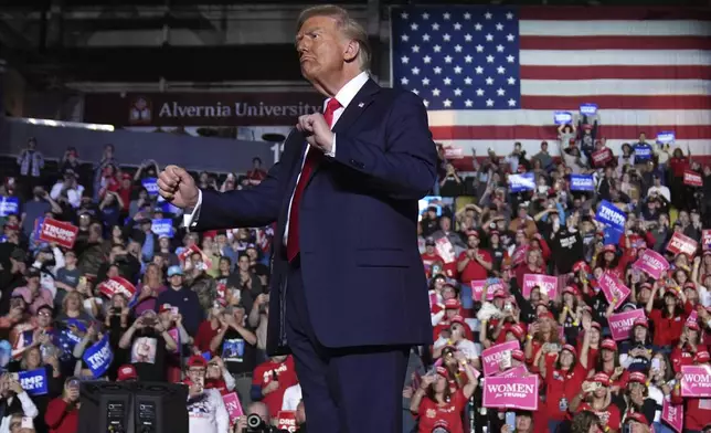 Republican presidential nominee former President Donald Trump dances during a campaign rally at Santander Arena, Monday, Nov. 4, 2024, in Reading, Pa. (AP Photo/Evan Vucci)