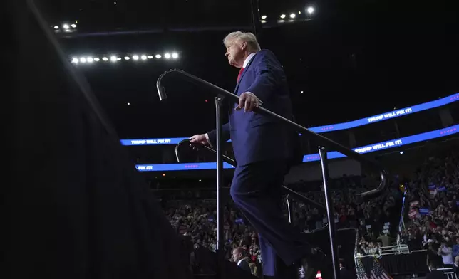 Republican presidential nominee former President Donald Trump arrives at a campaign rally at PPG Paints Arena, Monday, Nov. 4, 2024, in Pittsburgh, Pa. (AP Photo/Evan Vucci)