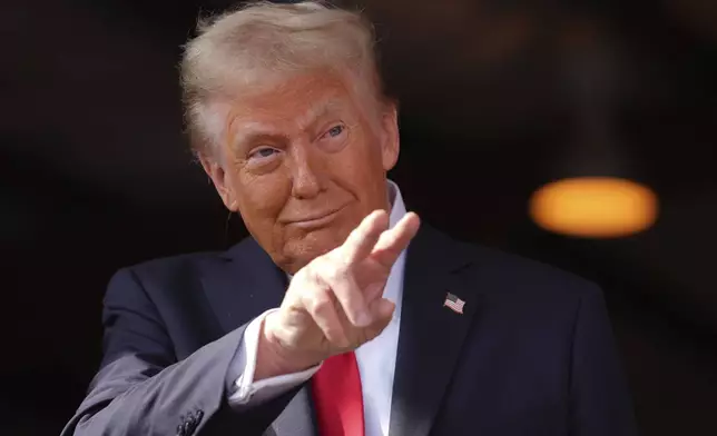 Republican presidential nominee former President Donald Trump arrives at a campaign rally at Gastonia Municipal Airport, Saturday, Nov. 2, 2024, in Gastonia, N.C. (AP Photo/Evan Vucci)