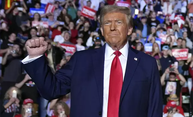 Republican presidential nominee former President Donald Trump arrives at a campaign rally at Santander Arena, Monday, Nov. 4, 2024, in Reading, Pa. (AP Photo/Evan Vucci)