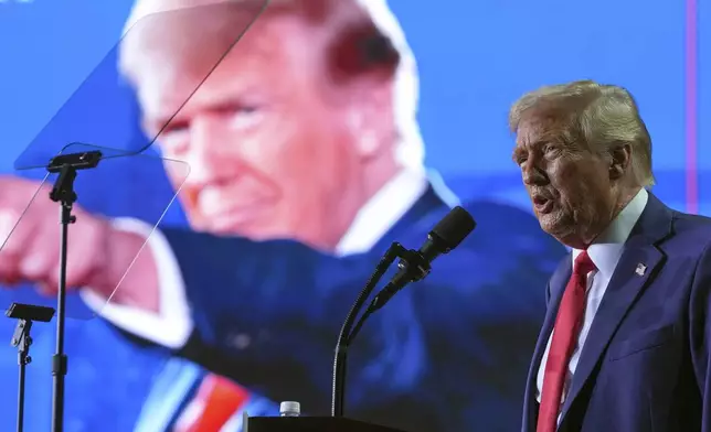 Republican presidential nominee former President Donald Trump speaks at a campaign rally at Van Andel Arena, Tuesday, Nov. 5, 2024, in Grand Rapids, Mich. (AP Photo/Evan Vucci)