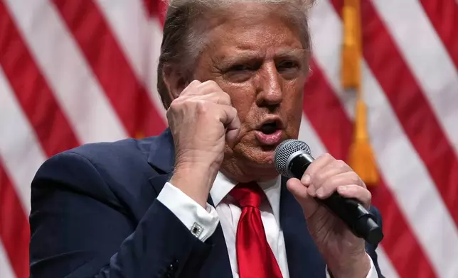 Republican presidential nominee former President Donald Trump speaks with Tucker Carlson during a Tucker Carlson Live Tour show at Desert Diamond Arena, Thursday, Oct. 31, 2024, in Glendale, Ariz. (AP Photo/Julia Demaree Nikhinson)