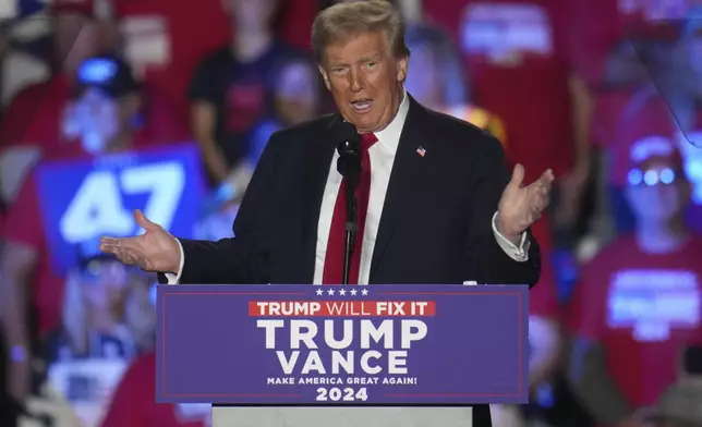 Republican presidential nominee former President Donald Trump speaks at a campaign rally at Macomb Community College Friday, Nov. 1, 2024, in Warren, Mich. (AP Photo/Paul Sancya)