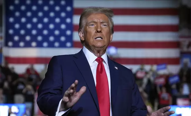 Republican presidential nominee former President Donald Trump arrives at a campaign rally at Santander Arena, Monday, Nov. 4, 2024, in Reading, Pa. (AP Photo/Evan Vucci)