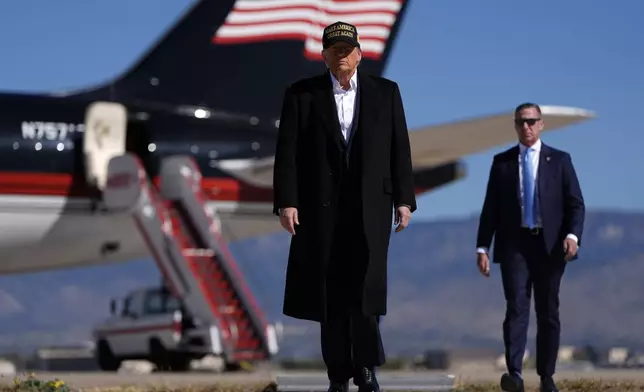 Republican presidential nominee former President Donald Trump arrives at a campaign rally at Albuquerque International Sunport, Thursday, Oct. 31, 2024, in Albuquerque, N.M. (AP Photo/Julia Demaree Nikhinson)