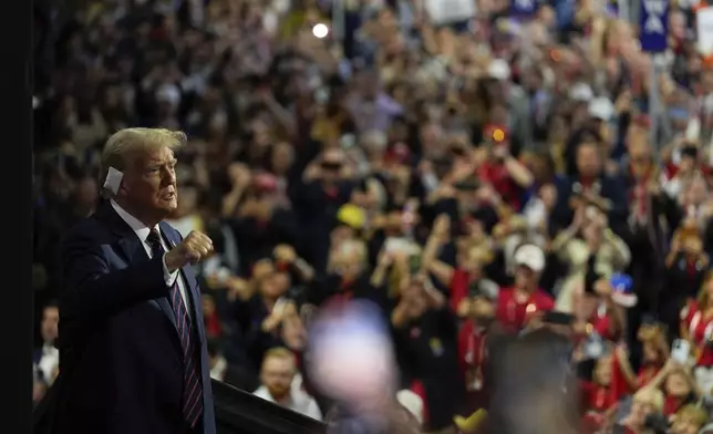 Republican presidential candidate former President Donald Trump gestures as he arrives at the Republican National Convention Wednesday, July 17, 2024, in Milwaukee. (AP Photo/Julia Nikhinson)