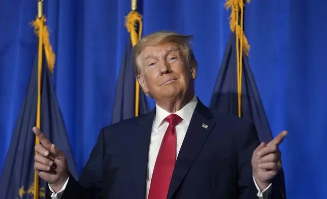 Former President Donald Trump gestures before speaking at the New Hampshire Federation of Republican Women Lilac Luncheon, Tuesday, June 27, 2023, in Concord, N.H. (AP Photo/Steven Senne)