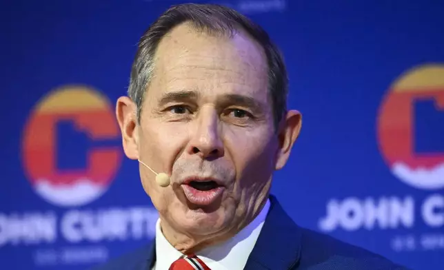 U.S. Rep. John Curtis speaks to supporters, Tuesday, Nov. 5, 2024, in Provo, Utah. (AP Photo/Alex Goodlett)