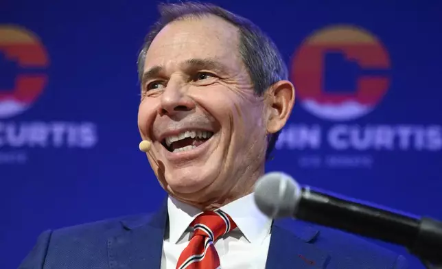 U.S. Rep. John Curtis speaks to supporters, Tuesday, Nov. 5, 2024, in Provo, Utah. (AP Photo/Alex Goodlett)