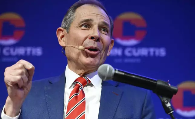 U.S. Rep. John Curtis speaks to supporters, Tuesday, Nov. 5, 2024, in Provo, Utah. (AP Photo/Alex Goodlett)