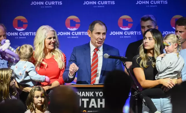 U.S. Rep. John Curtis speaks to supporters, Tuesday, Nov. 5, 2024, in Provo, Utah. (AP Photo/Alex Goodlett)