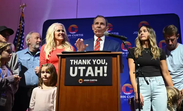 U.S. Rep. John Curtis speaks to supporters during a election night party Tuesday, Nov. 5, 2024, in Provo, Utah. (AP Photo/Alex Goodlett)