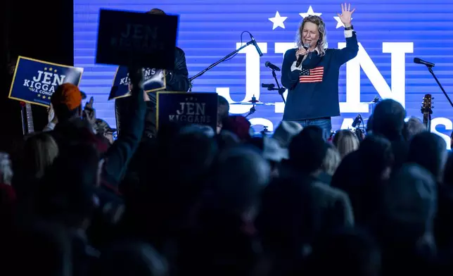 Republican incumbent Rep. Jen Kiggans, R-Va., running to represent Virginia's 2nd Congressional District in the U.S. House of Representatives, speaks to a crowd of supporters during a voting rally at Ballyhoos in Virginia Beach, Va., Monday, Nov. 4, 2024. (Kendall Warner/The Virginian-Pilot via AP)