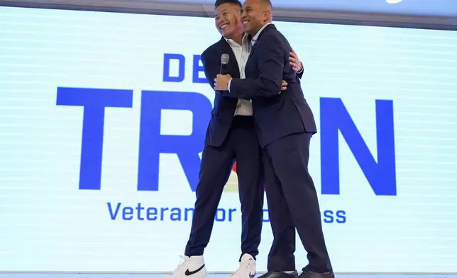 FILE - House Minority Leader Hakeem Jeffries, D-N.Y., greets Derek Tran during a campaign event at Golden Sea Restaurant, Saturday, Oct. 12, 2024, in Anaheim, Calif. (AP Photo/Julia Demaree Nikhinson,File)