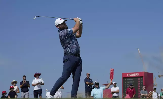 Tyrell Hatton of England tees off at 8th hole in the final round of Abu Dhabi Golf Championship in Abu Dhabi, United Arab Emirates, Sunday, Nov. 10, 2024. (AP Photo/Altaf Qadri)