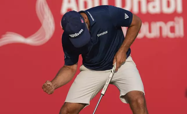 Paul Waring of England reacts after winning the Abu Dhabi Golf Championship in Abu Dhabi, United Arab Emirates, Sunday, Nov. 10, 2024. (AP Photo/Altaf Qadri)