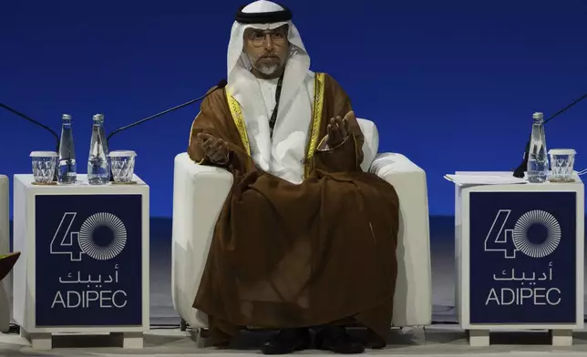 UAE Minister of Energy and Infrastructure Suhail al-Mazrouei talks in a panel during the inaugural session of the annual Abu Dhabi International Petroleum Exhibition and Conference (ADIPEC) in Abu Dhabi, United Arab Emirates, Monday, Nov. 4, 2024. (AP Photo/Altaf Qadri)