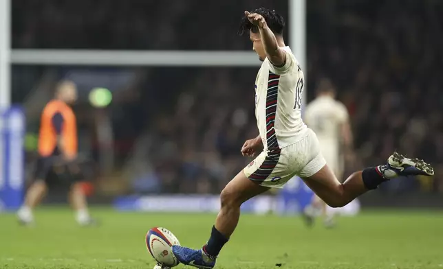 England's Marcus Smith kicks a penalty during the Autumn Nations series rugby union match between England and Australia, at Twickenham stadium, London Saturday, Nov. 9, 2024. (AP Photo/Ian Walton)