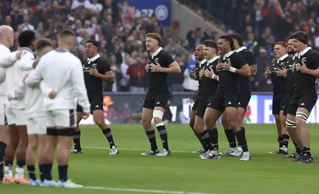 New Zealand's players perform the haka ahead of the Autumn Nations Series rugby match between England and New Zealand, at Twickenham stadium, in London Saturday, Nov. 2, 2024. (AP Photo/Ian Walton)