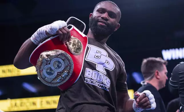 Jaron Ennis looks on after defending his title following the IBF World Welterweight title bout against Karen Chukhadzhian Saturday, Nov. 9, 2024, in Philadelphia. Jaron Ennis retains his IBF World Welterweight title with a unanimous decision. (AP Photo/Chris Szagola)