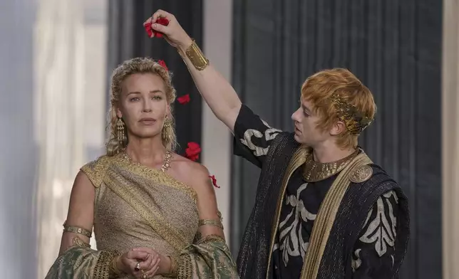 This image released by Paramount Pictures shows Connie Nielsen, left, and Joseph Quinn in a scene from "Gladiator II." (Aidan Monaghan/Paramount Pictures via AP)
