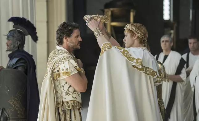 This image released by Paramount Pictures shows Pedro Pascal, left, and Joseph Quinn in a scene from "Gladiator II." (Aidan Monaghan/Paramount Pictures via AP)