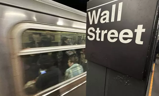 FILE - A train arrives at a Wall Street subway station in New York's Financial District on Nov. 5, 2024. (AP Photo/Peter Morgan, File)