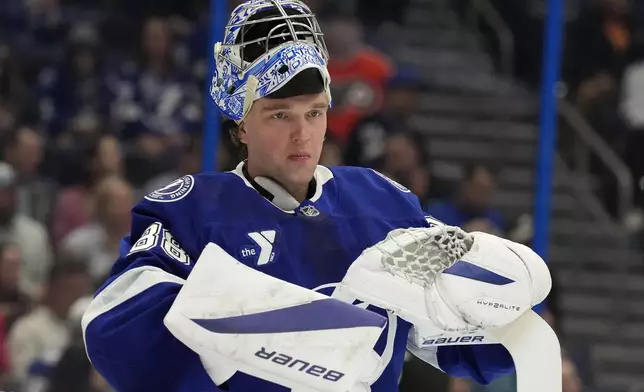 Tampa Bay Lightning goaltender Andrei Vasilevskiy (88) during a break in the first period of an NHL hockey game against the Philadelphia Flyers Thursday, Nov. 7, 2024, in Tampa, Fla. (AP Photo/Chris O'Meara)