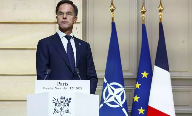 NATO Secretary General Mark Rutte delivers his speech during a meeting with French President Emmanuel Macron at the Elysee Palace, in Paris, France, Tuesday, Nov. 12, 2024. (Manon Cruz/ Pool Photo via AP)