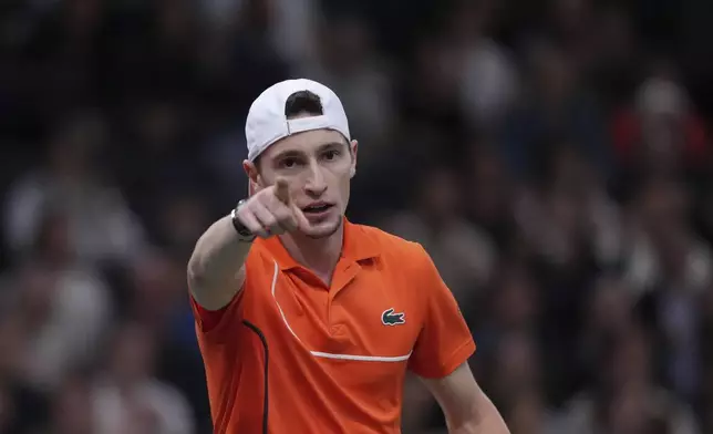 France's Ugo Humbert gestures during his quarterfinal match of the Paris Masters tennis tournament against Jordan Thompson, of Australia, at the Accor Arena, Friday, Nov. 1, 2024 in Paris. (AP Photo/Thibault Camus)