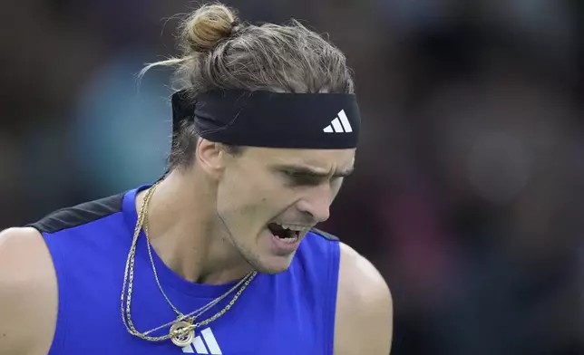 Germany's Alexander Zverev reacts after winning a point as he plays Greece's Stefanos Tsitsipas during their quarterfinal match of the Paris Masters tennis tournament at the Accor Arena, Friday, Nov. 1, 2024 in Paris. (AP Photo/Michel Euler)