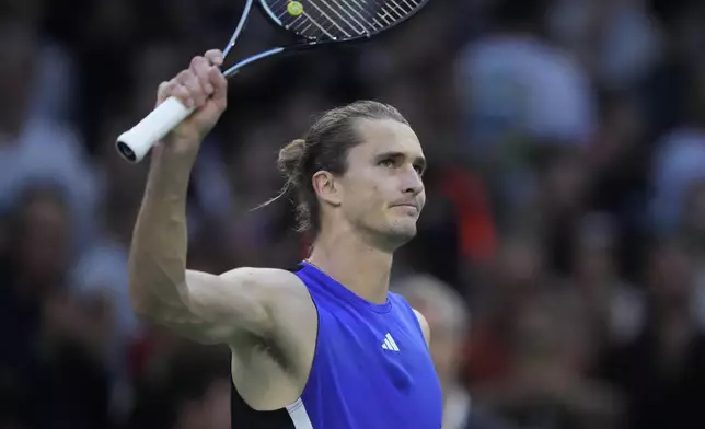 Germany's Alexander Zverev waves to the public after defeating Greece's Stefanos Tsitsipas during their quarterfinal match of the Paris Masters tennis tournament at the Accor Arena, Friday, Nov. 1, 2024 in Paris. (AP Photo/Michel Euler)