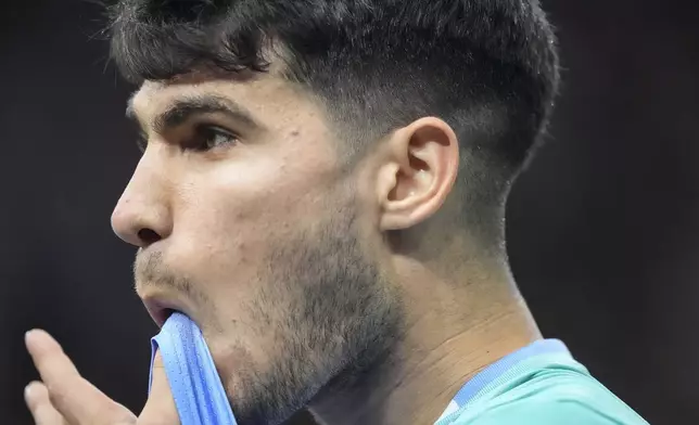 Spain's Carlos Alcaraz reacts as he plays France's Ugo Humbert in a third round match at the Paris Masters tennis tournament at the Accor Arena, Thursday, Oct. 31, 2024 in Paris. (AP Photo/Michel Euler)