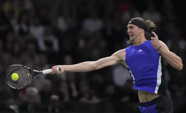 Germany's Alexander Zverev returns to France's Ugo Humbert during the final of the Paris Masters tennis tournament at the Accor Arena on Sunday, Nov. 3, 2024, in Paris. (AP Photo/Thibault Camus)