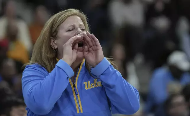 UCLA coach Cori Close reacts during an NCAA college basketball game against Louisville, Monday, Nov. 4, 2024, in Paris, France. (AP Photo/Aurelien Morissard)