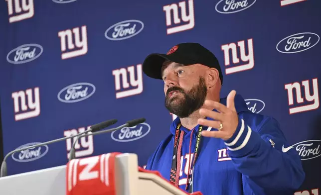 New York Giants head coach Brian Daboll attends a news conference in Munich, Germany, Friday, Nov. 8, 2024. The New York Giants are set to play the Carolina Panthers in an NFL game at the Allianz Arena in Munich on Sunday. (AP Photo/Lennart Preiss)