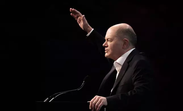 German Chancellor Olaf Scholz speaks to participants at the Deutsche Telekom AG forum, in Berlin, Thursday, Nov. 7, 2024. (Carsten Koall/dpa via AP)