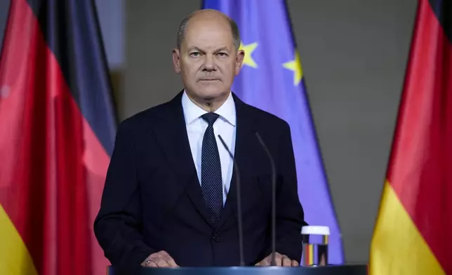 German Chancellor Olaf Scholz gives a statement after a meeting with government leaders in Berlin, Germany, Wednesday, Nov. 6, 2024. (AP Photo/Markus Schreiber)