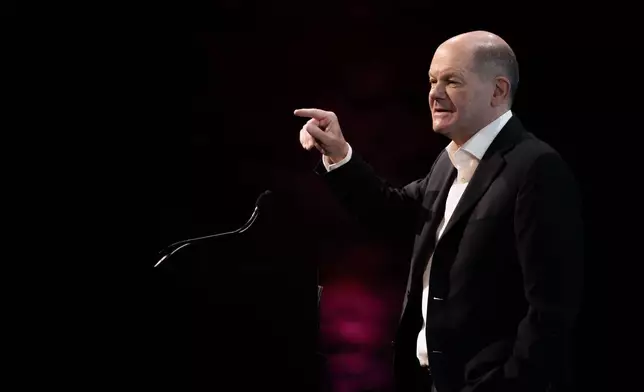 German Chancellor Olaf Scholz speaks to participants at the Deutsche Telekom AG forum, in Berlin, Thursday, Nov. 7, 2024. (Carsten Koall/dpa via AP)