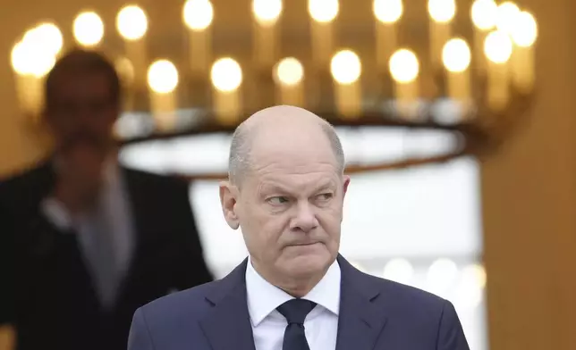 German Chancellor Olaf Scholz leaves Bellevue Palace in Berlin Thursday, Nov. 7, 2024. (Kay Nietfeld/dpa via AP)