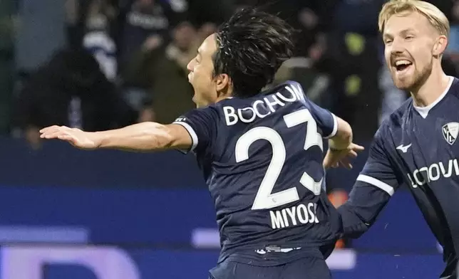 Bochum's Koji Miyoshi celebrates after scoring during the German Bundesliga soccer match between VfL Bochum and Bayer Leverkusen in Bochum, Germany, Saturday, Nov. 9, 2024. (AP Photo/Martin Meissner)