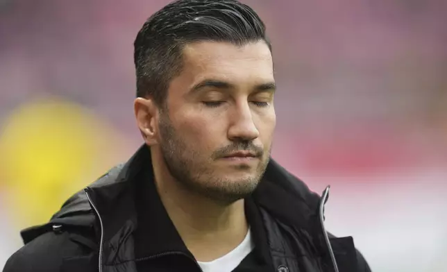 Dortmund coach Nuri Sahin during the German Bundesliga soccer match between 1. FSV Mainz 05 and Borussia Dortmund in Mainz, Germany, Saturday, Nov. 9, 2024. (Thomas Frey/dpa via AP)