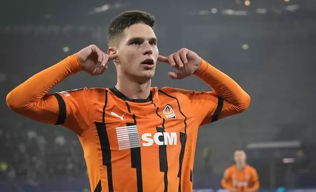 Shakhtar's Heorhiy Sudakov celebrates after scoring his side's second goal during the Champions League opening phase soccer match between Shakhtar Donetsk and Young Boys Bern at the Arena AufSchalke in Gelsenkirchen, Germany, Wednesday, Nov. 6, 2024. (AP Photo/Martin Meissner)