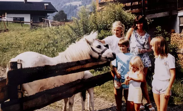 Repro of a photo pictured in Egelsbach, Germany, Thursday, Oct. 31, 2024 shows Claudia Huth and her children. (AP Photo/Michael Probst)